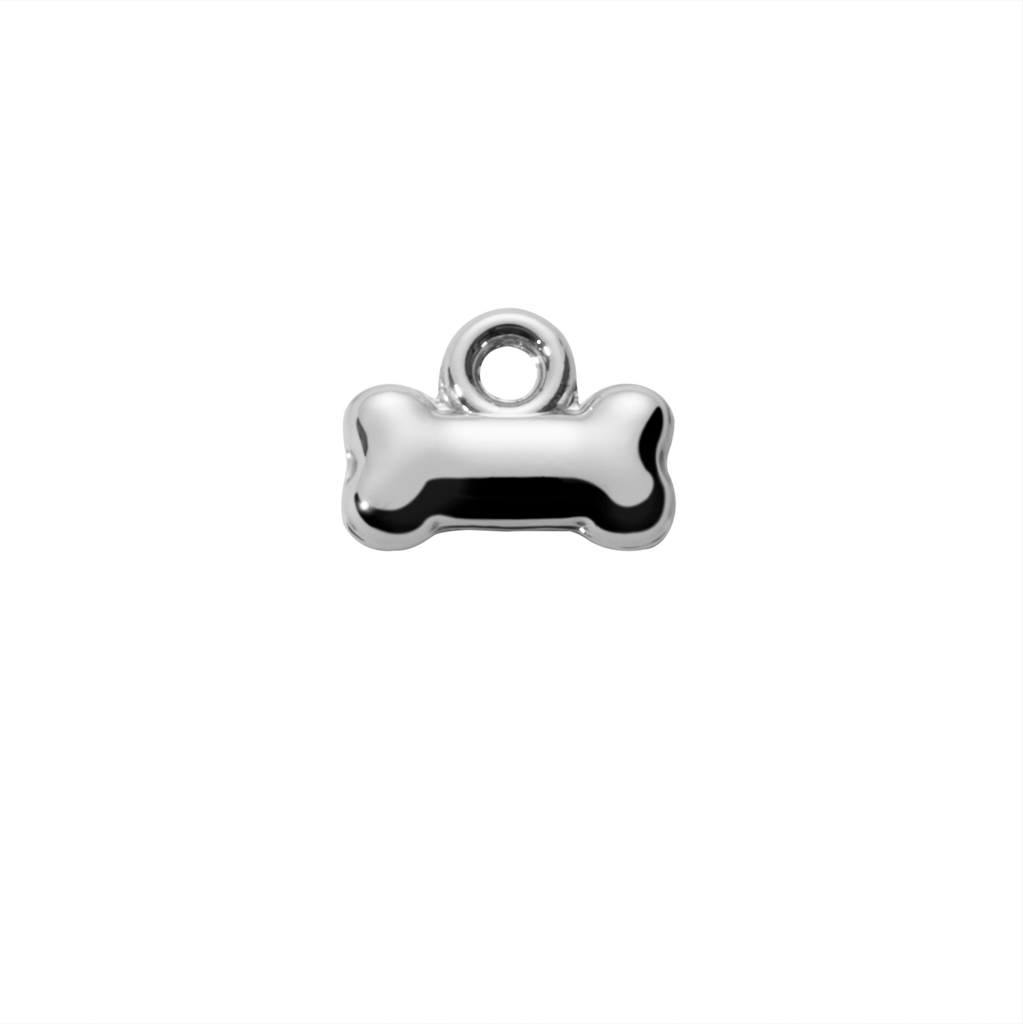 Silver bone-shaped charm on a white background