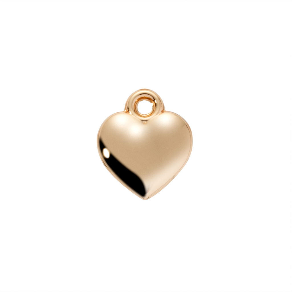 Gold heart-shaped pendant on a white background