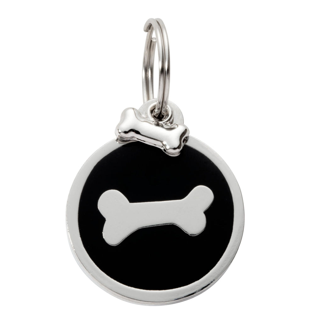 black bone pet tag with a polished silver charm